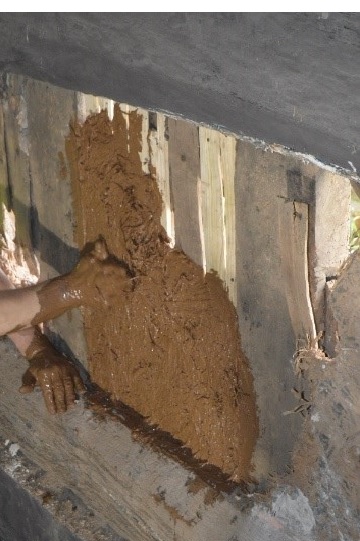 Repairing clay daub and lime plaster on panels of riven lath and insulating externally with insulated lime renders 